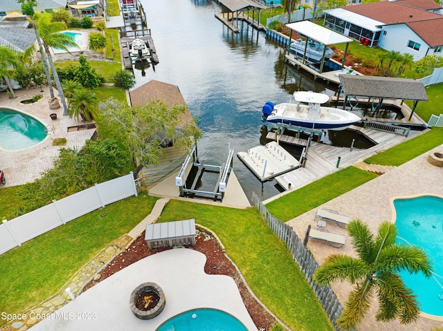 1455 Centaurus Ct, Merritt Island, FL 32953 - aerial perspective of suburban area featuring a pool area and a large body of water