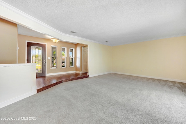 1455 Centaurus Ct, Merritt Island, FL 32953 - carpeted empty room featuring a textured ceiling and crown molding