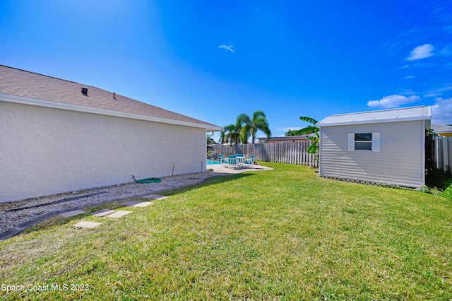 1455 Centaurus Ct, Merritt Island, FL 32953 - fenced backyard featuring an outdoor structure