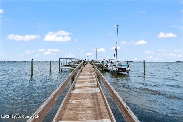 190 Shell Pl Unit 84, Rockledge, FL 32955 - dock area featuring a water view and boat lift