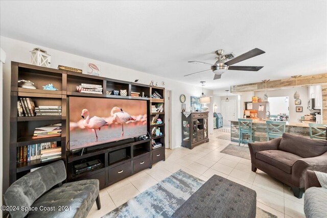 190 Shell Pl Unit 84, Rockledge, FL 32955 - living room with ceiling fan and light tile patterned floors