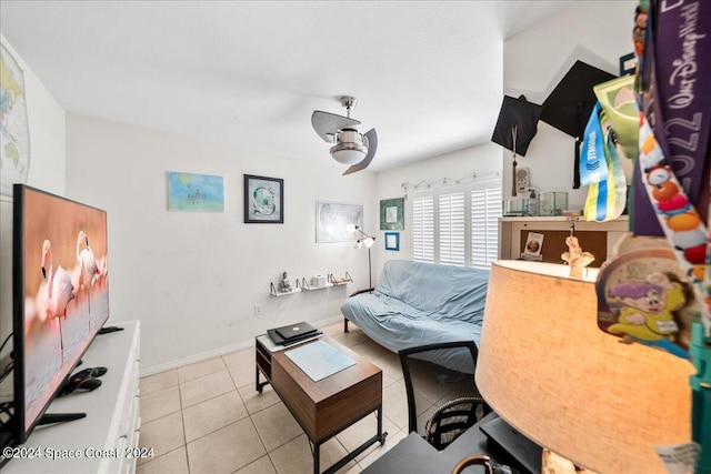 190 Shell Pl Unit 84, Rockledge, FL 32955 - living area featuring light tile patterned floors and baseboards