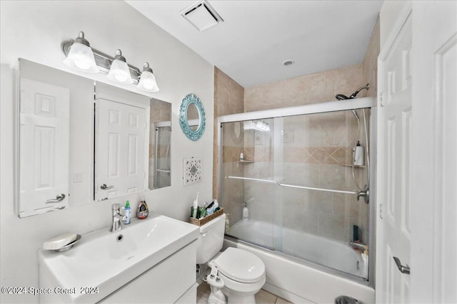 190 Shell Pl Unit 84, Rockledge, FL 32955 - bathroom featuring vanity, toilet, and enclosed tub / shower combo
