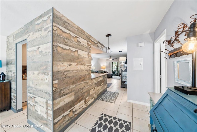 190 Shell Pl Unit 84, Rockledge, FL 32955 - hall with light tile patterned floors and baseboards