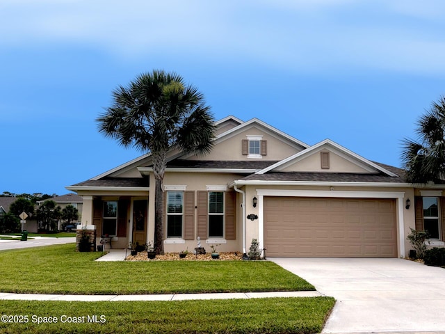 4070 Sage Brush Cir, Melbourne, FL 32901 - view of front facade with stucco siding, driveway, a front yard, and an attached garage