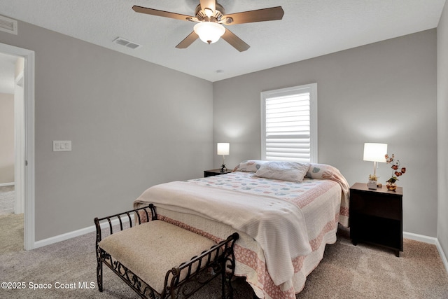 4070 Sage Brush Cir, Melbourne, FL 32901 - bedroom with light carpet and a ceiling fan