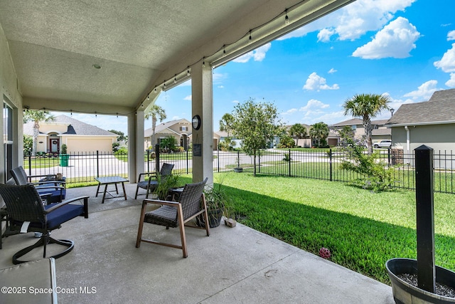 4070 Sage Brush Cir, Melbourne, FL 32901 - fenced backyard featuring a residential view and a patio