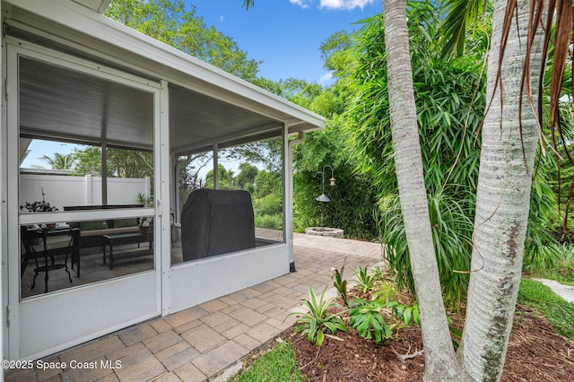 3469 Horse Creek Cir, Melbourne, FL 32935 - view of patio / terrace with a sunroom