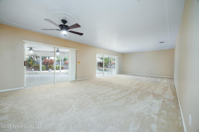 630 Seville Ct, Satellite Beach, FL 32937 - carpeted spare room featuring a ceiling fan and baseboards