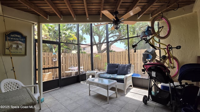8714 Jasmine Ct, Cape Canaveral, FL 32920 - sunroom with ceiling fan, outdoor lounge area, and beam ceiling