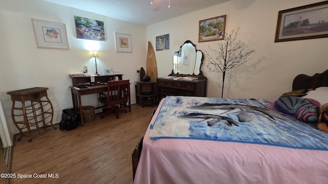 8714 Jasmine Ct, Cape Canaveral, FL 32920 - bedroom featuring wood finished floors