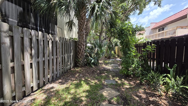8714 Jasmine Ct, Cape Canaveral, FL 32920 - view of fenced backyard