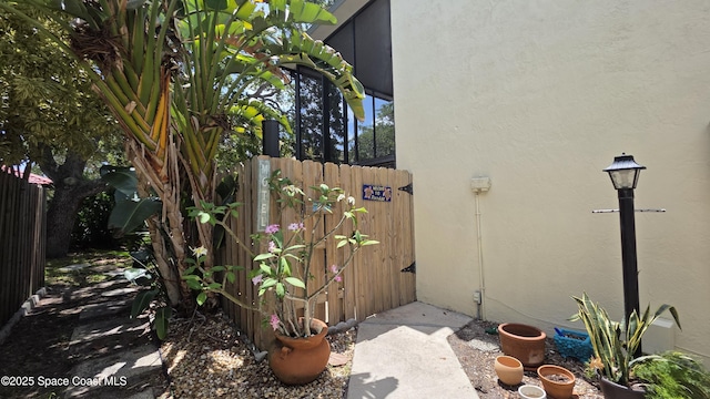 8714 Jasmine Ct, Cape Canaveral, FL 32920 - view of home's exterior featuring stucco siding
