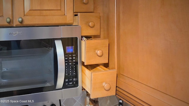 8714 Jasmine Ct, Cape Canaveral, FL 32920 - kitchen view of stainless steel microwave