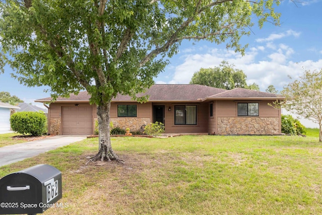 662 Estaugh St NW, Palm Bay, FL 32907 - single story home featuring stone siding, a garage, concrete driveway, and a front lawn