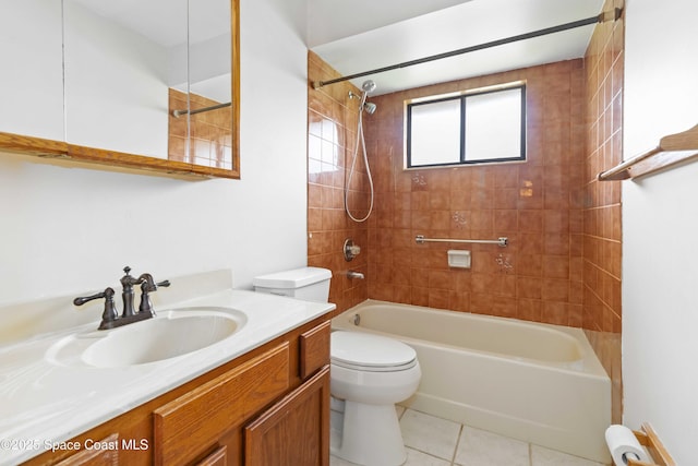 662 Estaugh St NW, Palm Bay, FL 32907 - bathroom with toilet, washtub / shower combination, vanity, and tile patterned floors