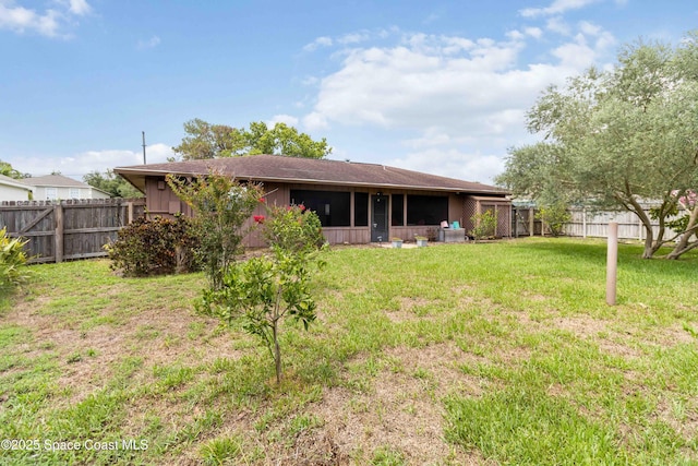662 Estaugh St NW, Palm Bay, FL 32907 - back of house with roof with shingles