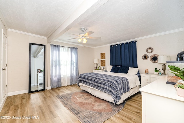 670 S Oak Park Cir E, Merritt Island, FL 32953 - bedroom featuring light wood-style floors, ornamental molding, a textured ceiling, a ceiling fan, and beamed ceiling