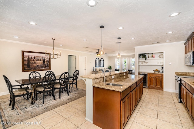 670 S Oak Park Cir E, Merritt Island, FL 32953 - kitchen with wine cooler, electric range, recessed lighting, brown cabinetry, and a kitchen island with sink