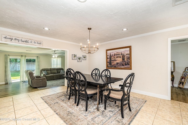 670 S Oak Park Cir E, Merritt Island, FL 32953 - dining area featuring light tile patterned flooring, a chandelier, crown molding, recessed lighting, and ceiling fan