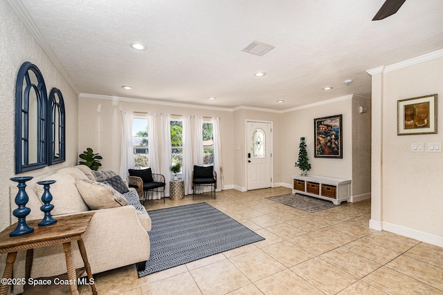 670 S Oak Park Cir E, Merritt Island, FL 32953 - foyer entrance featuring light tile patterned floors, ornamental molding, recessed lighting, and ceiling fan