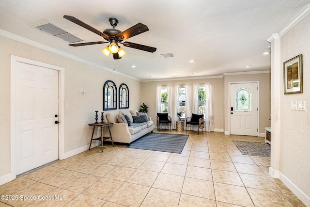 670 S Oak Park Cir E, Merritt Island, FL 32953 - entryway featuring crown molding, ceiling fan, light tile patterned floors, recessed lighting, and a textured wall