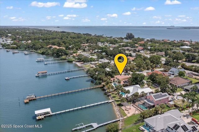 1999 S Misty Harbor Pl, Merritt Island, FL 32952 - aerial view of residential area featuring a large body of water