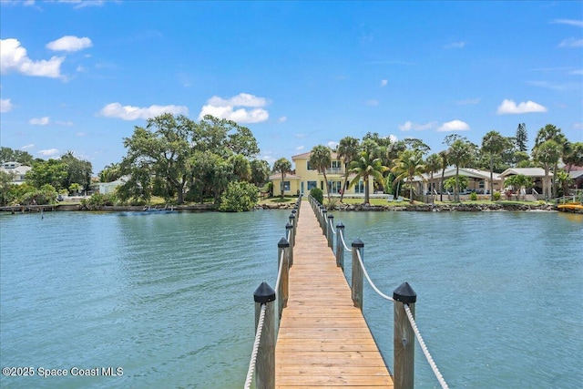 1999 S Misty Harbor Pl, Merritt Island, FL 32952 - dock area featuring a water view