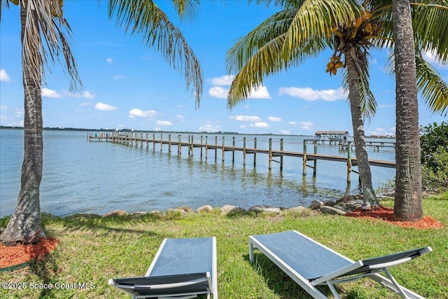 1999 S Misty Harbor Pl, Merritt Island, FL 32952 - dock area featuring a water view