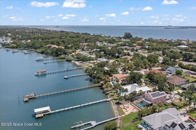 1999 S Misty Harbor Pl, Merritt Island, FL 32952 - aerial perspective of suburban area with a nearby body of water