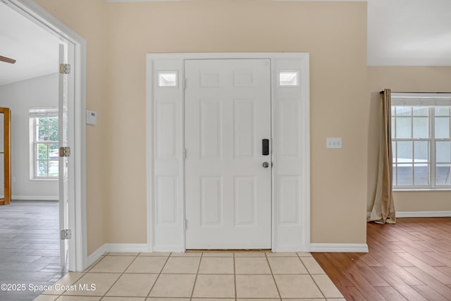 1486 Beche St SE, Palm Bay, FL 32909 - foyer featuring baseboards and light wood-style floors