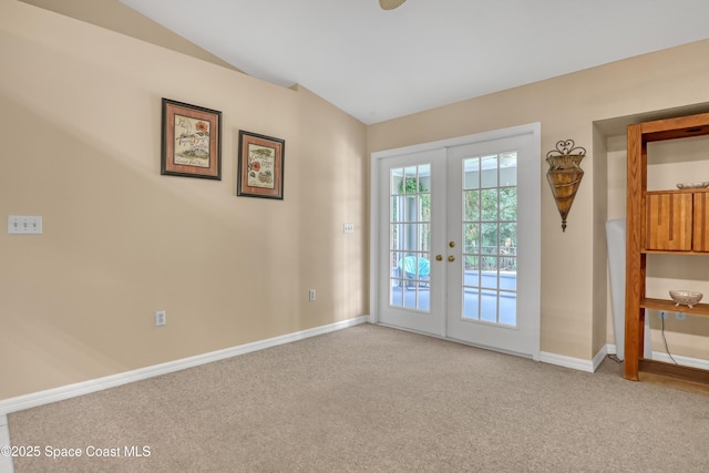 1486 Beche St SE, Palm Bay, FL 32909 - doorway featuring lofted ceiling, french doors, and carpet floors
