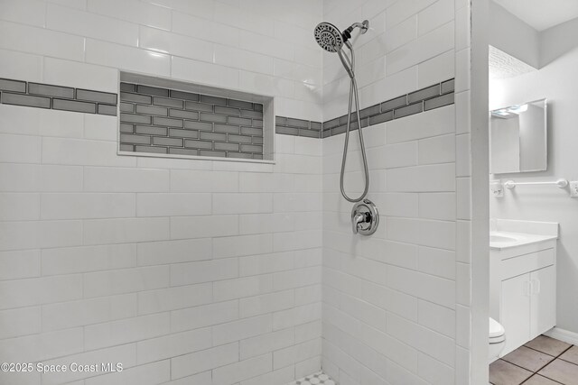 1486 Beche St SE, Palm Bay, FL 32909 - bathroom with vanity, tiled shower, and tile patterned floors