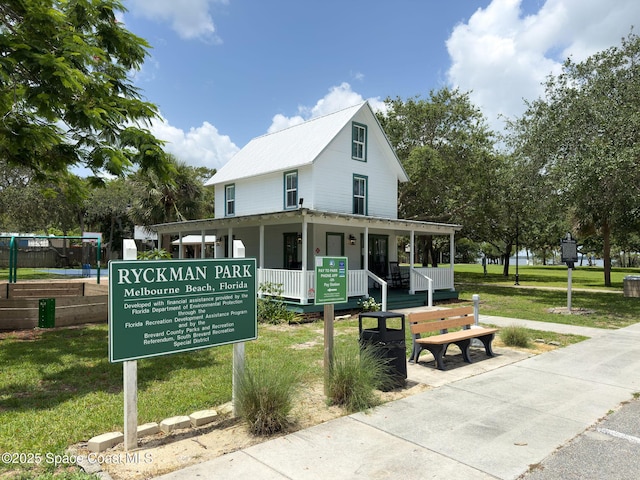 1700 Atlantic St Unit 1, Melbourne Beach, FL 32951 - view of community with a lawn