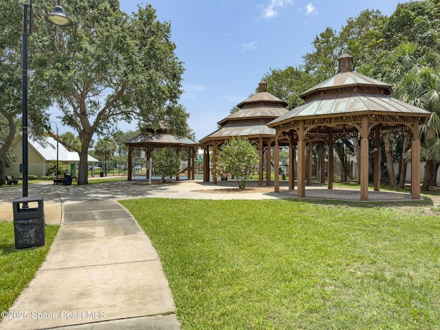 1700 Atlantic St Unit 1, Melbourne Beach, FL 32951 - view of property's community with a gazebo and a yard