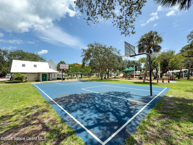 1700 Atlantic St Unit 1, Melbourne Beach, FL 32951 - view of basketball court with community basketball court and a lawn