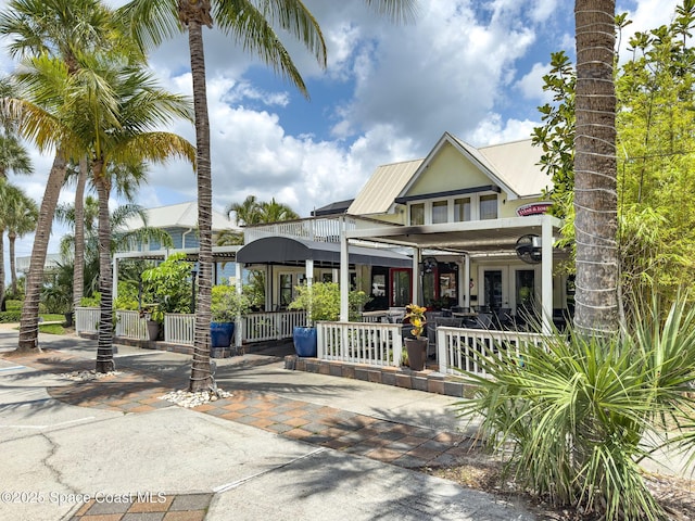 1700 Atlantic St Unit 1, Melbourne Beach, FL 32951 - view of front of home featuring covered porch