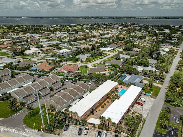 1700 Atlantic St Unit 1, Melbourne Beach, FL 32951 - aerial view of property's location with a nearby body of water and nearby suburban area