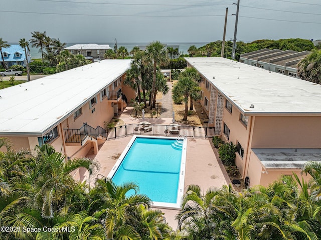 1700 Atlantic St Unit 1, Melbourne Beach, FL 32951 - community pool featuring a gate and a patio area