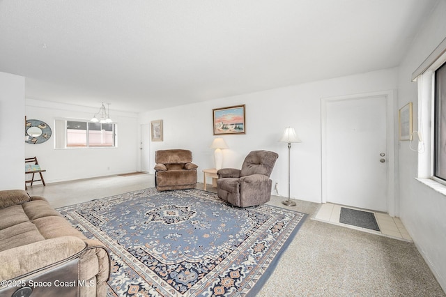 1700 Atlantic St Unit 1, Melbourne Beach, FL 32951 - living room with carpet floors