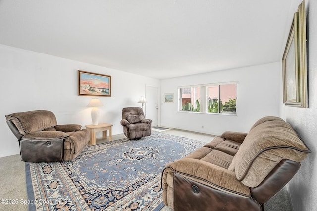 1700 Atlantic St Unit 1, Melbourne Beach, FL 32951 - living room featuring carpet and baseboards