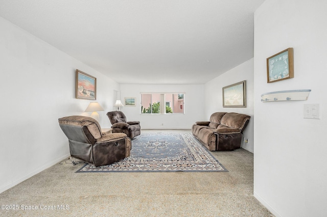 1700 Atlantic St Unit 1, Melbourne Beach, FL 32951 - living room featuring carpet floors and baseboards
