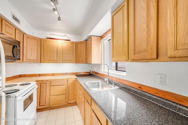 1700 Atlantic St Unit 1, Melbourne Beach, FL 32951 - kitchen featuring a sink, electric stove, black microwave, light tile patterned flooring, and dark countertops
