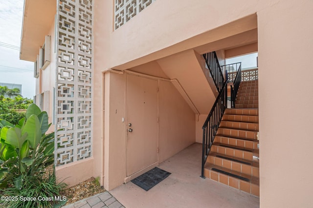 1700 Atlantic St Unit 1, Melbourne Beach, FL 32951 - property entrance featuring stucco siding