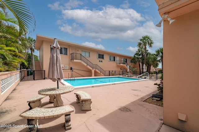 1700 Atlantic St Unit 1, Melbourne Beach, FL 32951 - community pool featuring stairway and a patio area
