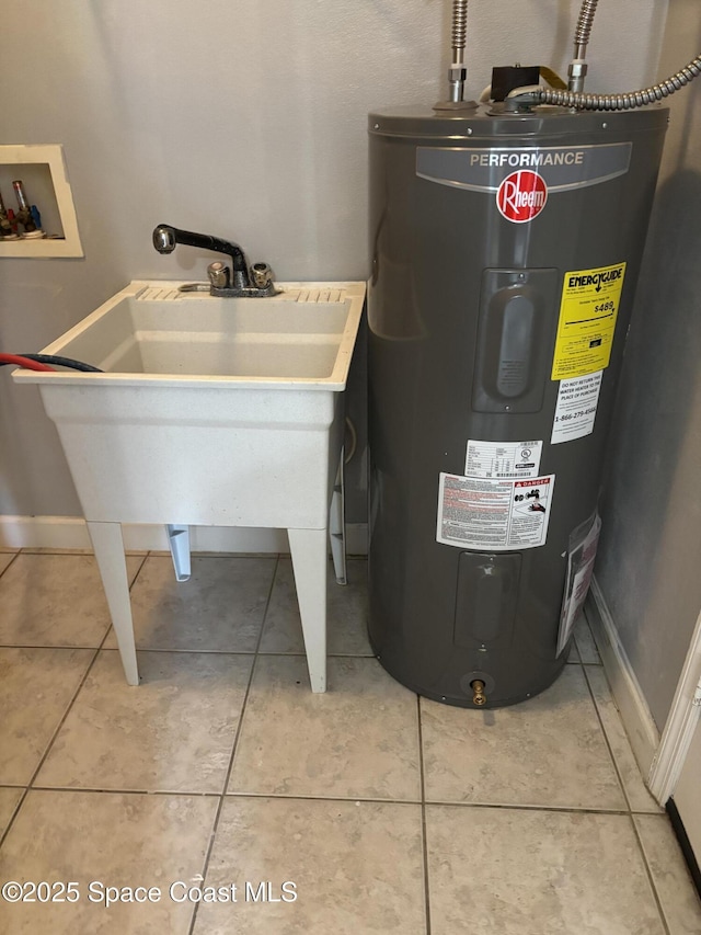 3197 Weyburn Ave SE, Palm Bay, FL 32909 - utility room featuring water heater and a sink