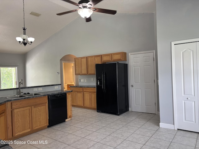 3197 Weyburn Ave SE, Palm Bay, FL 32909 - kitchen with black appliances, a sink, high vaulted ceiling, dark countertops, and arched walkways