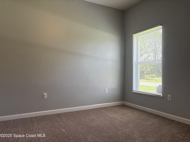 3197 Weyburn Ave SE, Palm Bay, FL 32909 - carpeted empty room with baseboards