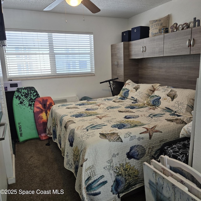935 S Atlantic Ave Unit 234, Daytona Beach, FL 32118 - carpeted bedroom featuring a textured ceiling and a ceiling fan