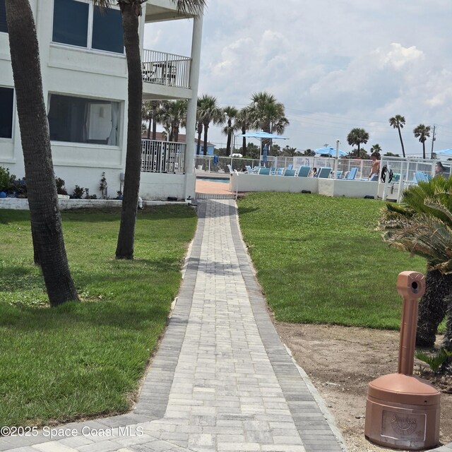 935 S Atlantic Ave Unit 234, Daytona Beach, FL 32118 - view of property's community with a lawn